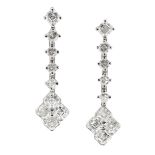 A PAIR OF 7.50 CARAT DIAMOND DROP EARRINGS in 18ct white gold each formed of a cluster of four