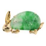 A JADEITE JADE AND RUBY RABBIT / BUNNY BROOCH in high carat yellow gold, in the form of a rabbit,