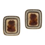 A PAIR OF ANTIQUE CAMEO CUFFLINKS / CAPE CLIPS in 18ct yellow gold, each cushion shaped face set