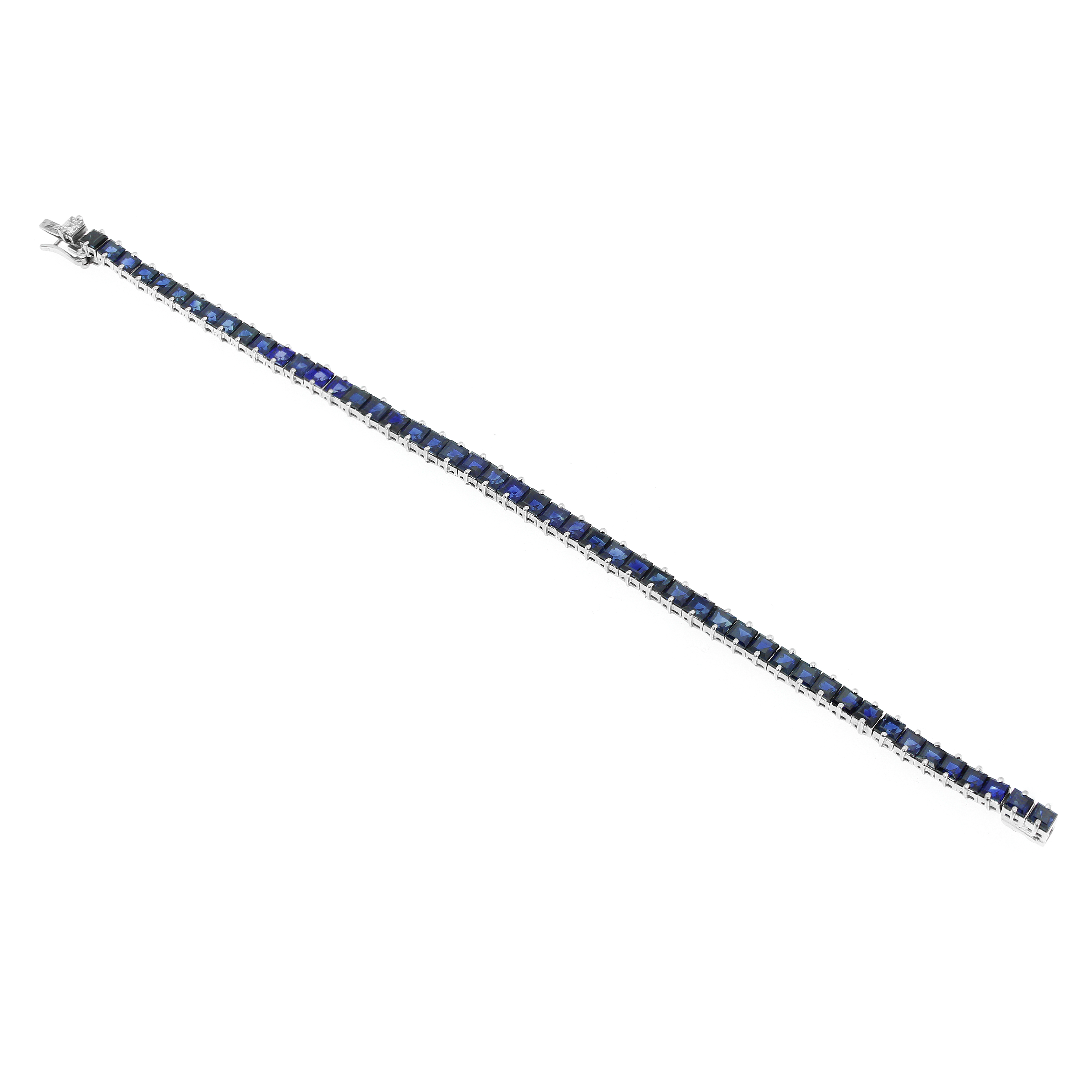 A SAPPHIRE AND DIAMOND LINE BRACELET in 18ct white gold, comprising a single row of forty-nine