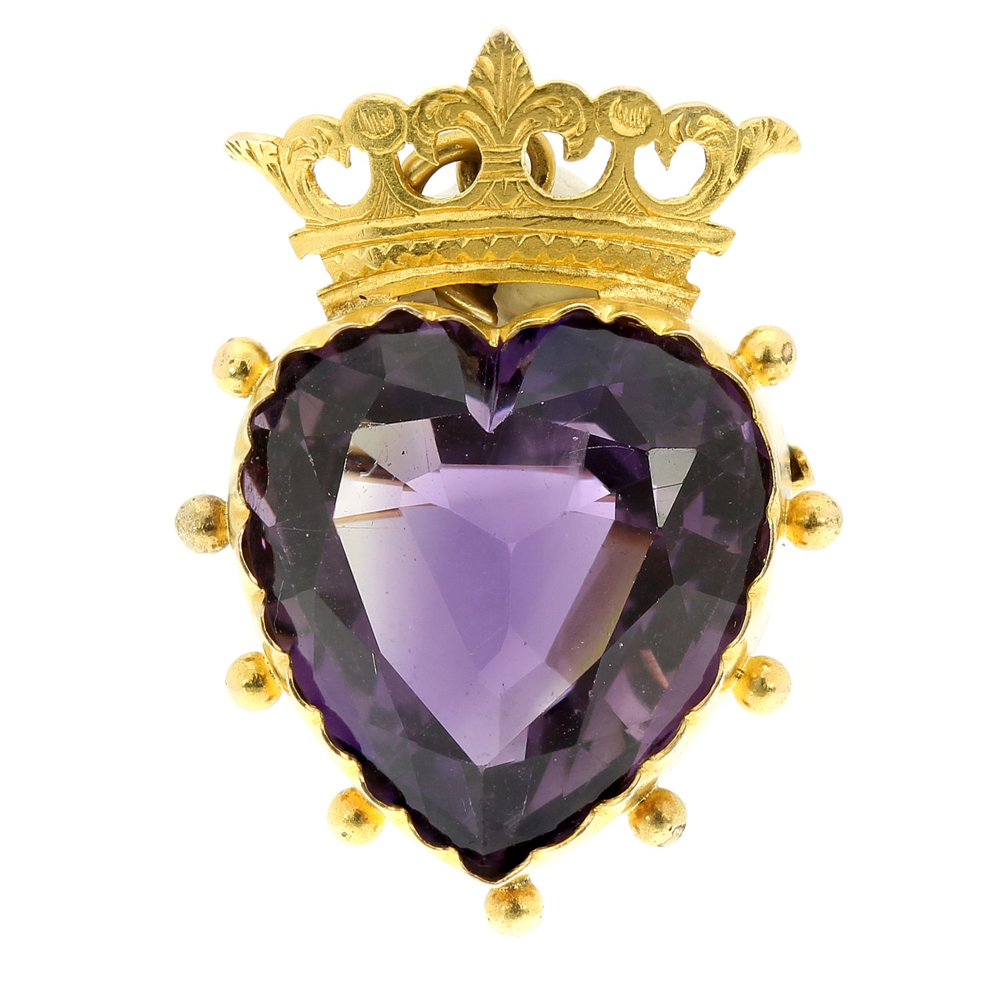 AN ANTIQUE AMETHYST HEART PENDANT, 19TH CENTURY in 15ct yellow gold, set with a heart cut amethyst