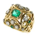 AN ANTIQUE EMERALD AND DIAMOND DRESS RING, BOUCHERON in 18ct yellow gold, set with a central cut