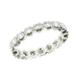 A 1.35 CARAT DIAMOND ETERNITY RING in platinum comprising a single row of round cut diamonds