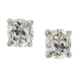 A PAIR OF 2.0 CARAT DIAMOND STUD EARRINGS in 18ct white gold each set with an old oval cut diamond