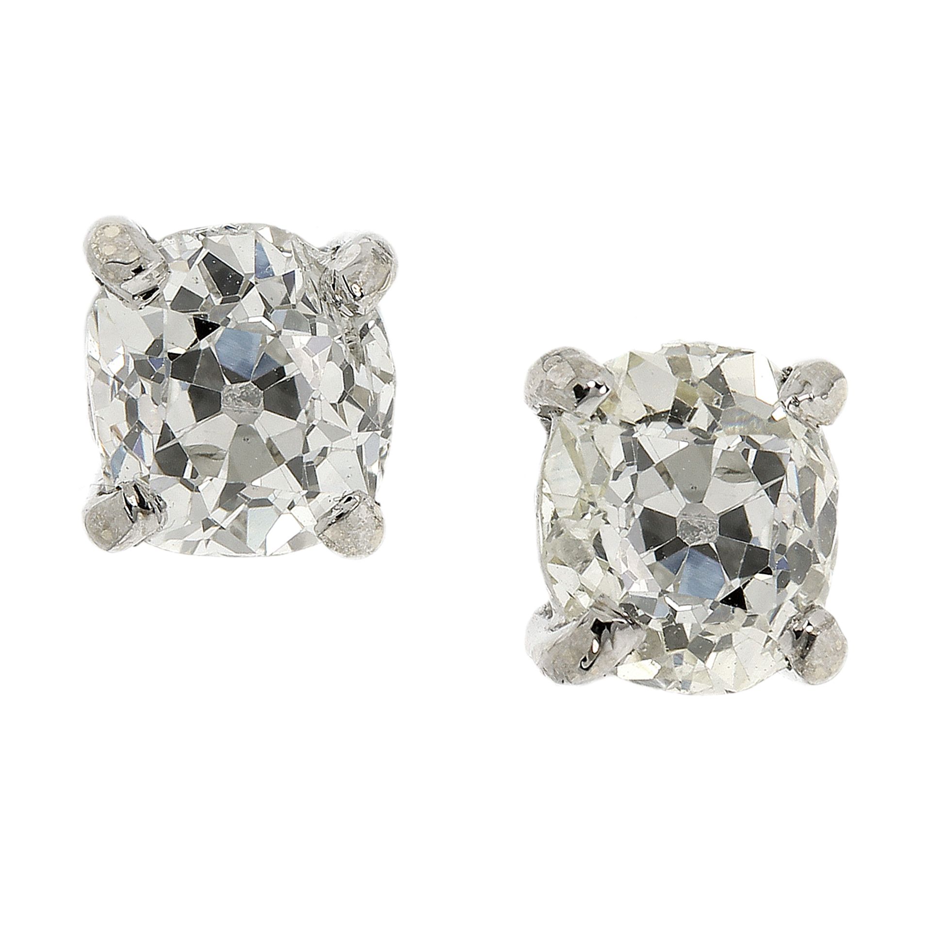 A PAIR OF 2.0 CARAT DIAMOND STUD EARRINGS in 18ct white gold each set with an old oval cut diamond