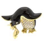 A JEWELLED DIAMOND AND ENAMEL PENGUIN BROOCH, GARRARD & CO in 18ct yellow gold designed to depict