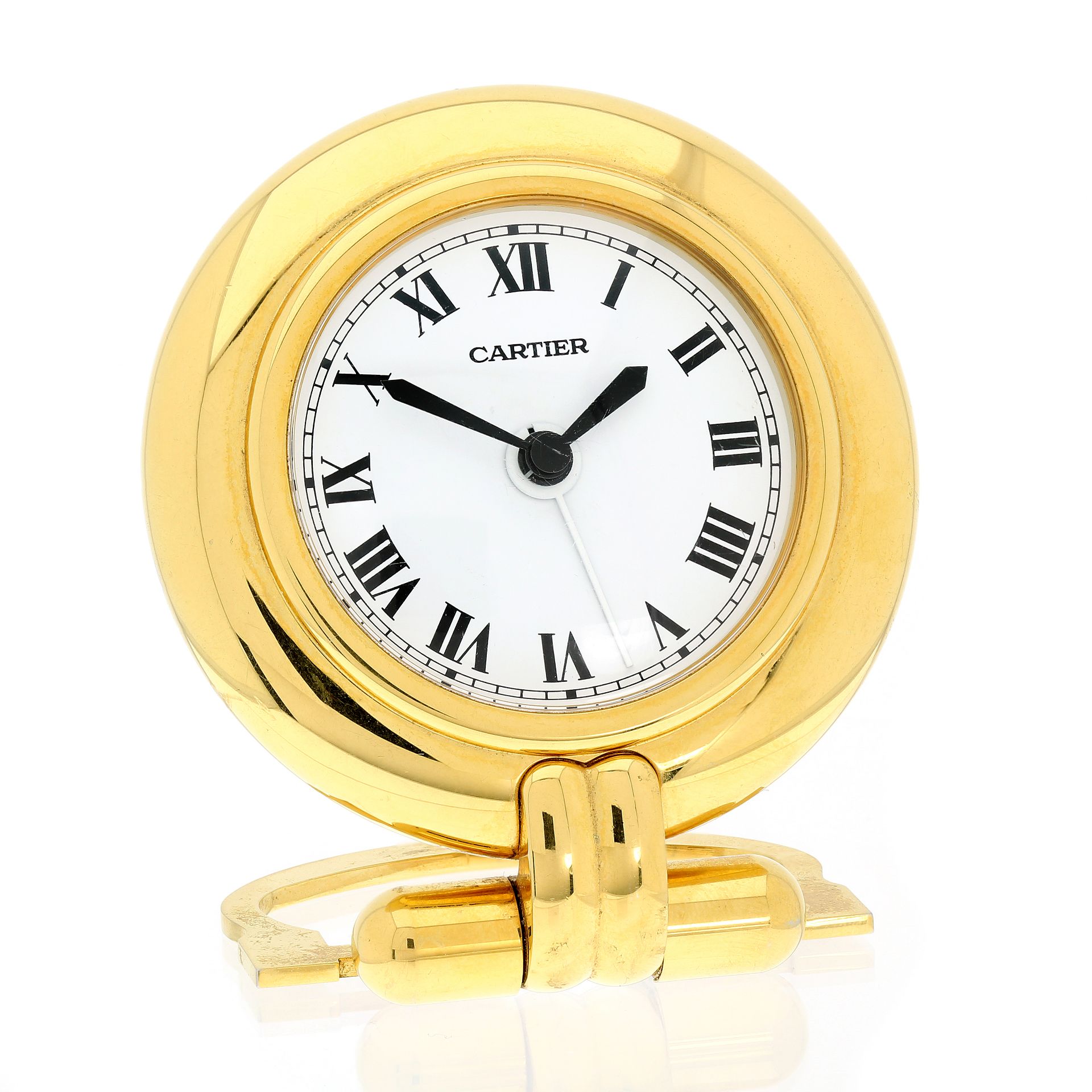 A VINTAGE TRAVEL / DESK CLOCK, CARTIER CIRCA 1980 24 carat gold plated, of circular form with a