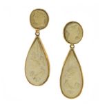 A PAIR OF ANTIQUE VOLCANIC LAVA CAMEO EARRINGS each designed as a tapering drop carved in detail