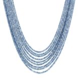 A FACETED SAPPHIRE BEAD NECKLACE in 14ct white gold, comprising nine rows of faceted sapphire