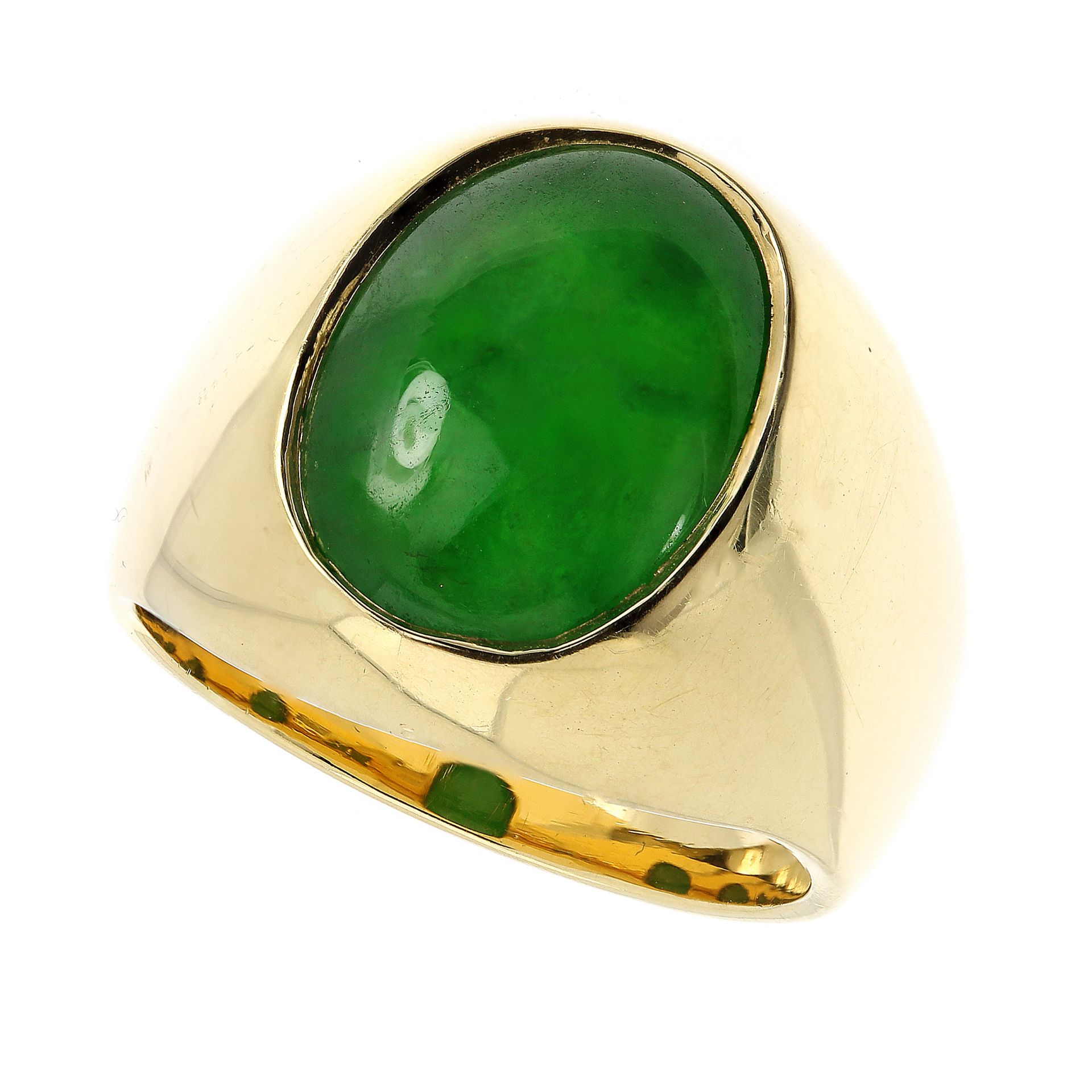 A JADEITE JADE DRESS RING in 18ct yellow gold, set with a large oval cabochon piece of jade of
