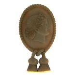 AN ANTIQUE CARVED IVORY CAMEO BROOCH, LATE 19TH CENTURY carved in detail to depict the bust of a