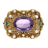 AN ANTIQUE AMETHYST, EMERALD AND PEARL BROOCH in high carat yellow gold, set with a large oval cut