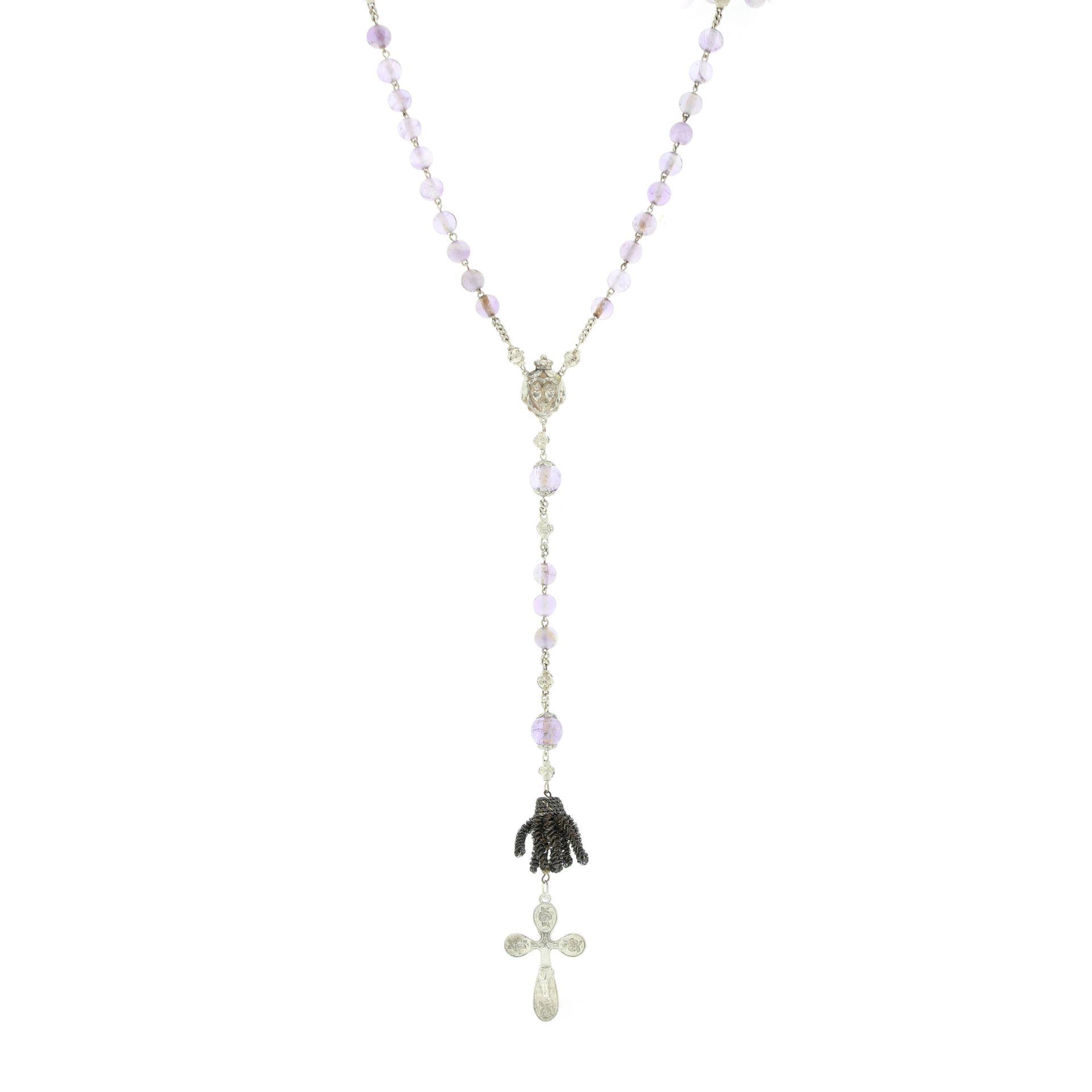 A SET OF AMETHYST AND HAIRWORK ROSARY BEADS in silver, comprising polished amethyst beads with