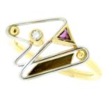 AN ABSTRACT DIAMOND AND PINK TOURMALINE RING in 18ct yellow gold and white gold or platinum, set