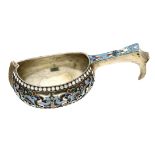 AN ANTIQUE IMPERIAL RUSSIAN ENAMELED SILVER KOVSH of typical form, the bowl and handle decorated