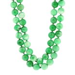 A JADEITE JADE BEAD NECKLACE comprising a single row of seventy two polished jade beads of 15.7-16.