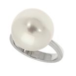 A LARGE PEARL DRESS RING in 18ct white gold, set with a single pearl of 15.3mm to a tapering band,