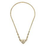 AN ANTIQUE PEARL STAR AND MOON NECKLET in yellow gold, designed with a moon and stars motif,