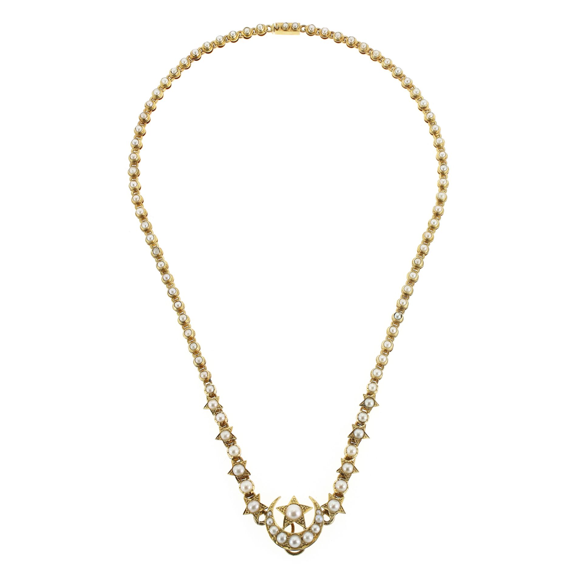 AN ANTIQUE PEARL STAR AND MOON NECKLET in yellow gold, designed with a moon and stars motif,