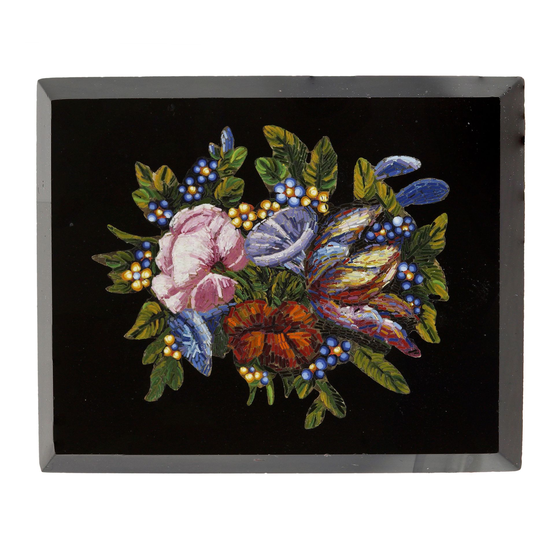 AN ANTIQUE MICROMOSAIC JEWEL the rectangular black hardstone panel inset with a micromosaic