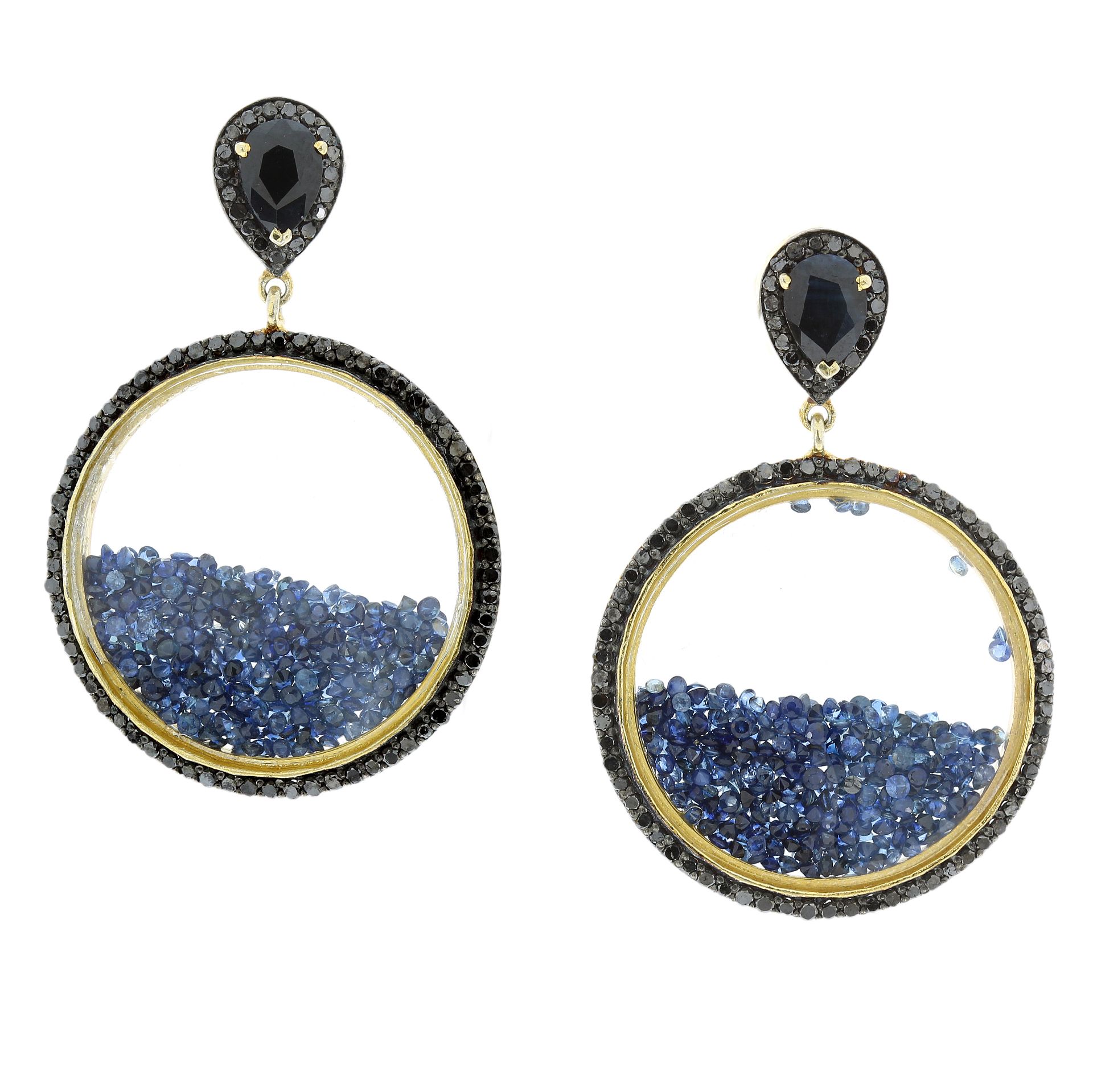 A PAIR OF SAPPHIRE AND BLACK DIAMOND EARRINGS in silver and yellow gold, each designed as a circular