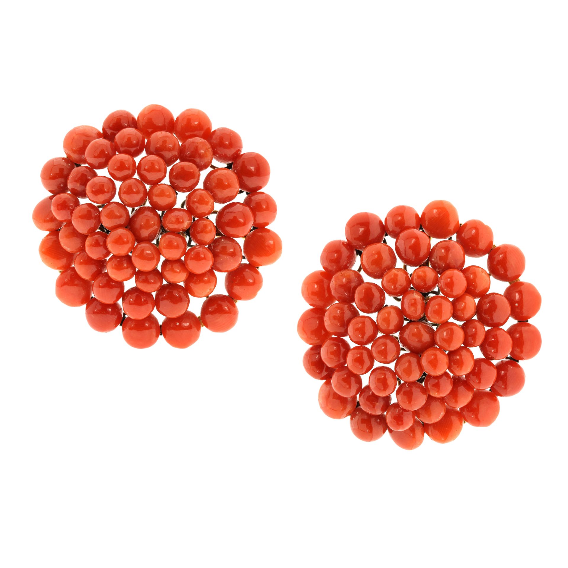 A PAIR OF VINTAGE CORAL BEAD CLUSTER BROOCHES each formed of a spiral of graduated coral beads up to