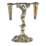 AN ANTIQUE SILVER PLATED TABLE CENTREPIECE, ELKINGTON & CO designed as a cherub supporting two