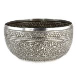 AN ANTIQUE INDIAN SILVER BOWL, KUTCH CIRCA 1880 of circular form, the body chased all over with
