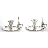 A PAIR OF ANTIQUE VICTORIAN STERLING SILVER CHAMBERSTICKS AND SNUFFERS BY HENRY WILKINSON & CO,