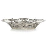 AN ANTIQUE GERMAN SILVER DISH, CIRCA 1900 of navette form with stylised border, the dish pierced and