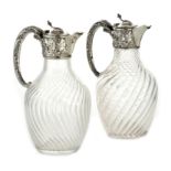 A PAIR OF ANTIQUE SILVER MOUNTED GLASS CLARET JUGS, FRENCH CIRCA 1880 each baluster body with