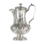 AN ANTIQUE WILLIAM IV IRISH STERLING SILVER HOT WATER JUG BY RICHARD SAWYER, DUBLIN 1832 the