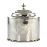 AN ANTIQUE GEORGE III STERLING SILVER TEA CADDY BY HESTER BATEMAN, LONDON 1783 the oval body with