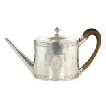 AN ANTIQUE STERLING SILVER TEAPOT BY JOHN LAMBE of flattened cylindrical form with bright cut