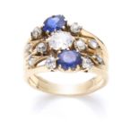 AN ANTIQUE DIAMOND AND SAPPHIRE DRESS RING in high carat yellow gold, set with a central old cut