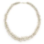 A MOONSTONE NECKLACE in sterling silver, formed of a single row of chain suspending many oval