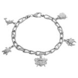 A DIAMOND AND RUBY ANIMAL CHARM BRACELET in silver, formed of curb links jewelled with diamonds
