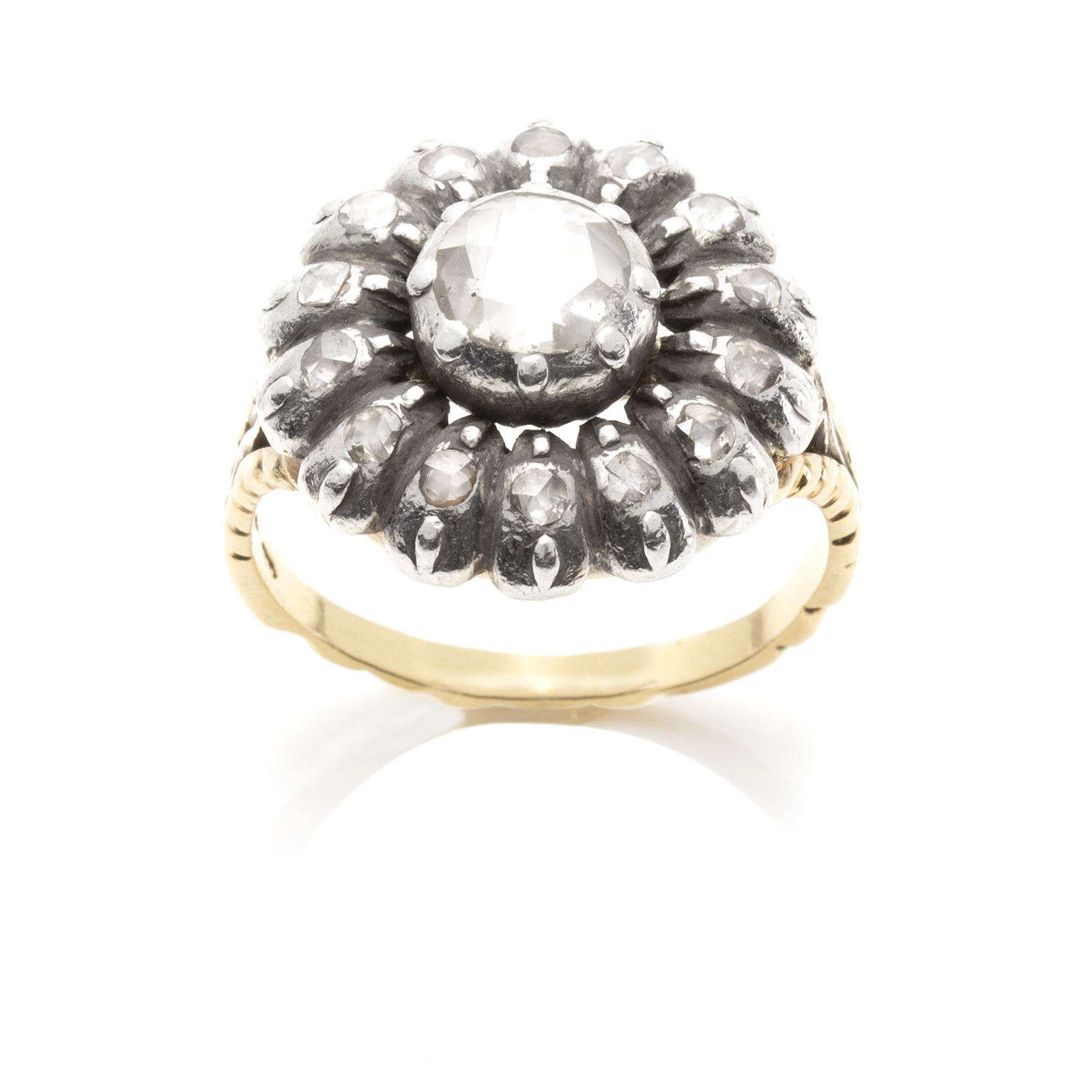 AN ANTIQUE DIAMOND CLUSTER DRESS RING, 19TH CENTURY in high carat yellow gold and silver, set with a