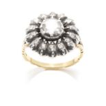 AN ANTIQUE DIAMOND CLUSTER DRESS RING, 19TH CENTURY in high carat yellow gold and silver, set with a