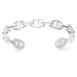 A CHAINE D'ANCRE ENCHAINEE BRACELET / BANGLE, HERMES in sterling silver, designed as a single row of