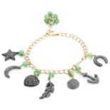 A DIAMOND AND EMERALD CHARM BRACELET formed of curb links, suspending seven various diamond jewelled