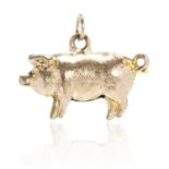 A MINIATURE PIG / PIGLET CHARM in yellow gold, designed as a pig, 2.1cm, 1g.