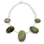 A LABRADORITE NECKLACE in silver, comprising a single row of five graduated oval labradorite