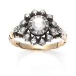 AN ANTIQUE DIAMOND CLUSTER DRESS RING, 19TH CENTURY in high carat yellow gold and silver, set with a