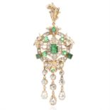 AN ANTIQUE EMERALD AND DIAMOND PENDANT / BROOCH in high carat yellow gold, set with a central