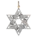 A DIAMOND STAR OF DAVID PENDANT formed as a star of David motif jewelled with step and rose cut