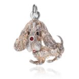 A NOVELTY ENAMELLED DOG PENDANT in sterling silver, designed as a dog in comic relief, its eyes