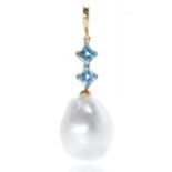 A BAROQUE PEARL AND TOPAZ PENDANT in 18ct yellow gold, set with a large baroque pearl suspended