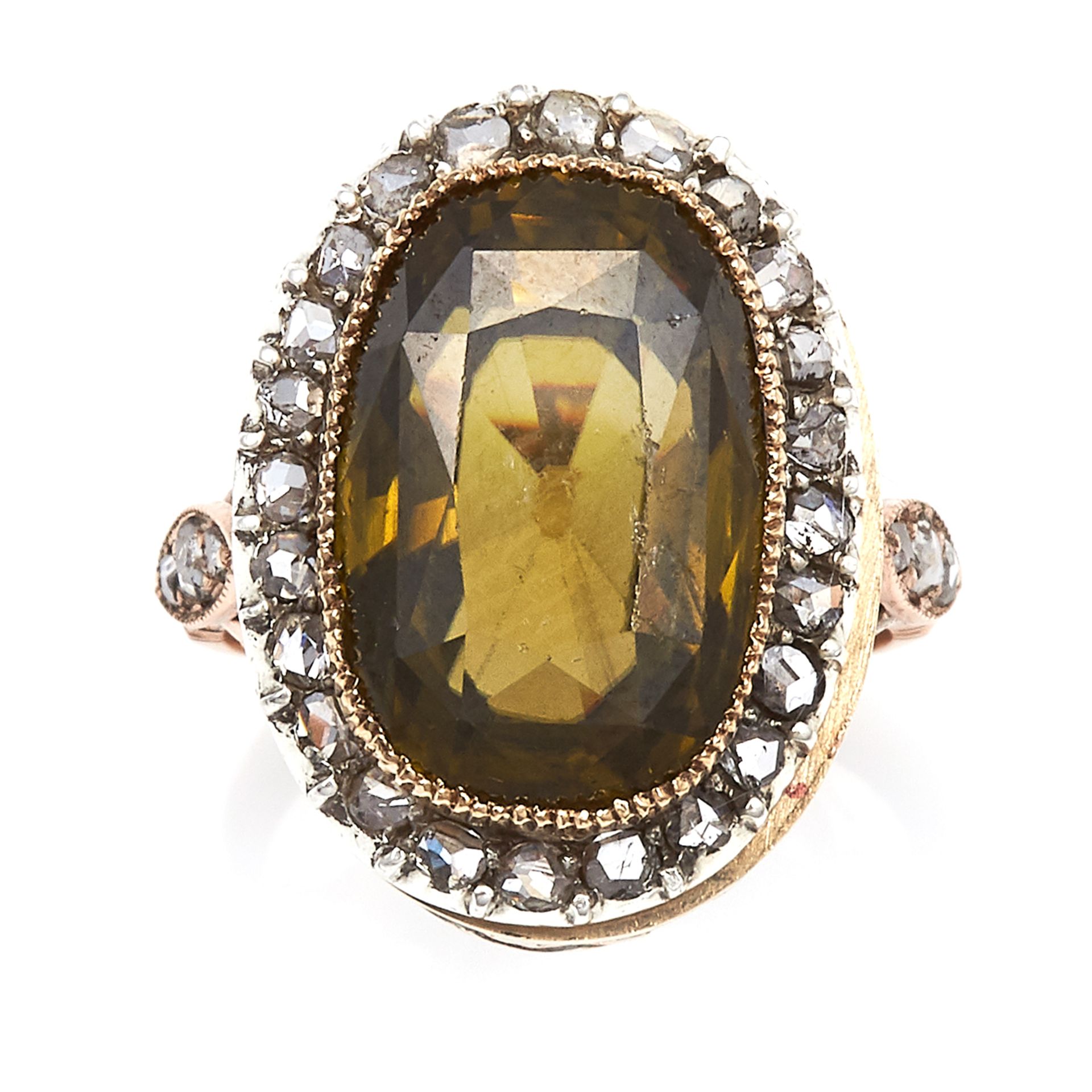 AN ANTIQUE GREEN ZIRCON AND DIAMOND CLUSTER RING in 18ct yellow gold, set with an oval cut green