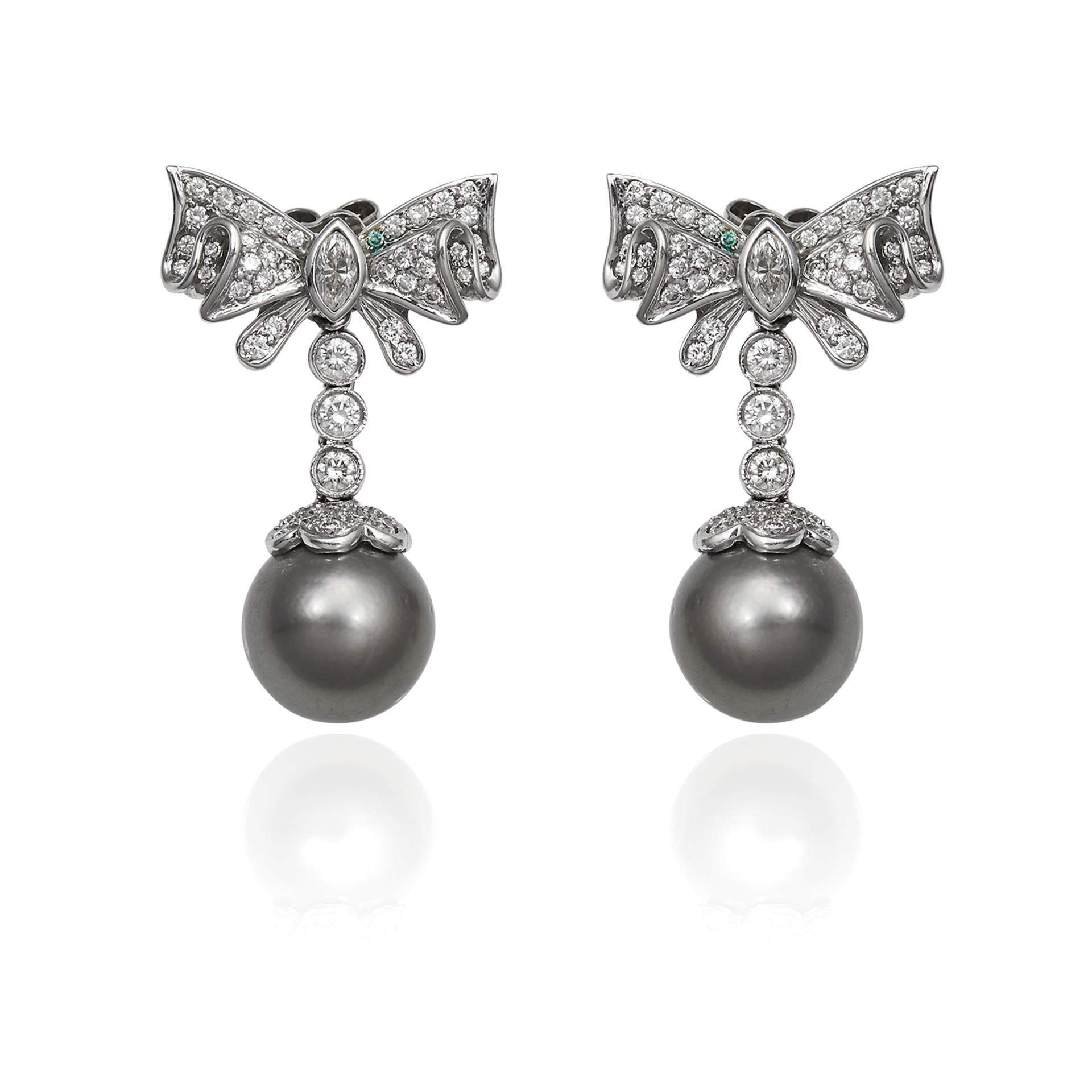 A PEARL AND DIAMOND EARRING AND PENDANT SUITE in 18ct white gold, the pendant set with a pearl of